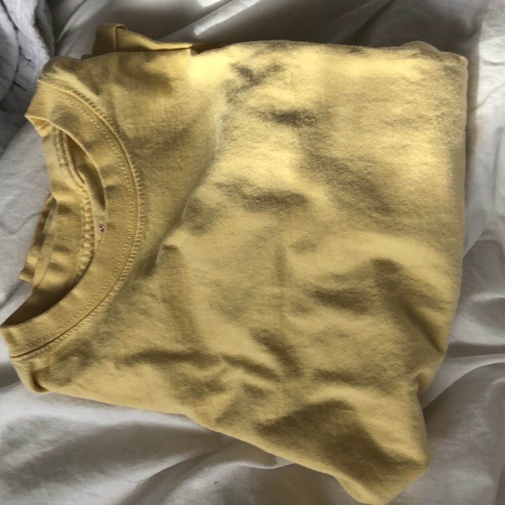 Yellow Hanes shirt